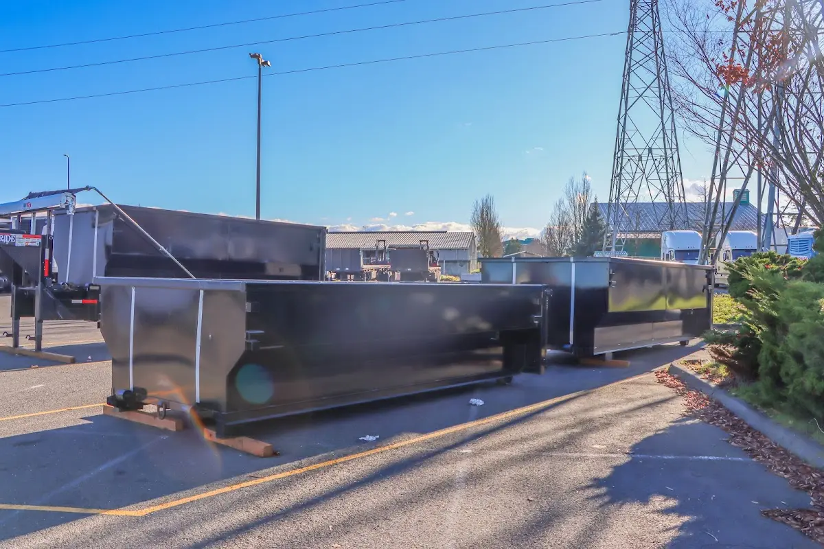 Roll-off dumpster ready for waste disposal at job site for 2 Yard Dumpster Rental in Atoka